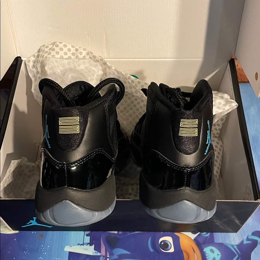 Kids Air Jordan 11 Retro Gamma
Black and Blue High-Top Sneakers - Picture 5 of 7